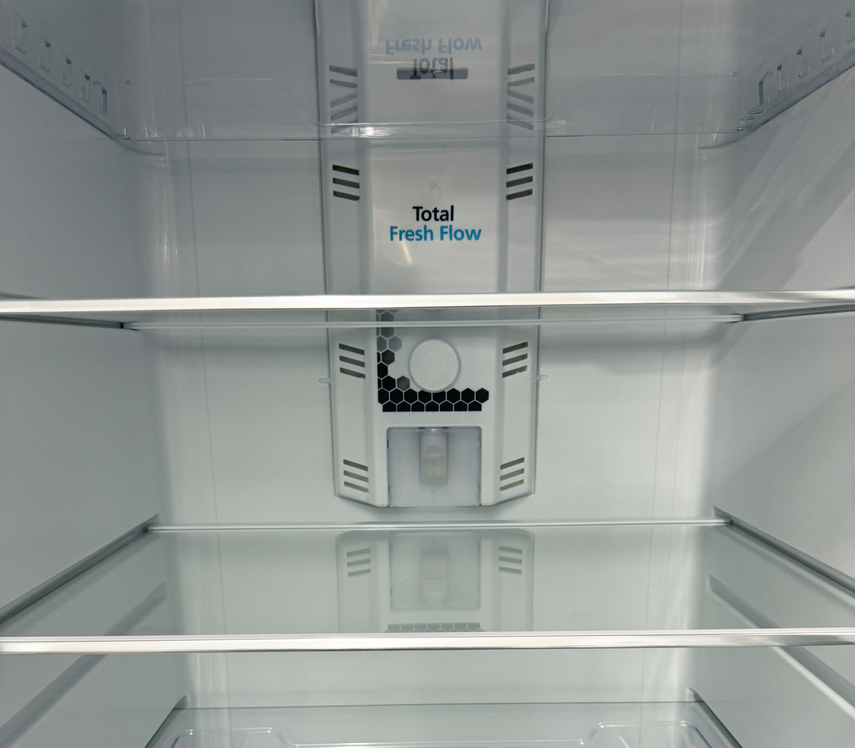 Nevera top mount 400 litros con panel dispensador Silver Mabe